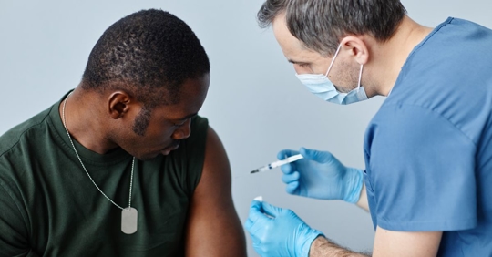 Military Worker Getting Medical Care